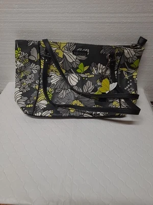 Bolso de Mano Sakroots Artist Circle Metro en Patrón Floral Negro y Amarillo Foto 1 de 4