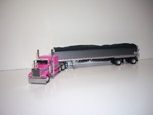 DCP FIRST GEAR 1/64 PINK TRI-AXLE PETE 379 W/T SLEEPER&50' GRAY BELTED TRAILER