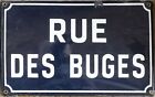 Old blue French street sign enamel on steel plate road plaque des Buges Auvergne