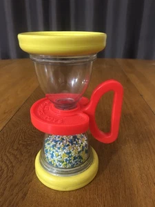 DE COLECCIÓN FISHER PRICE #451 SHAKE 'N ROLL RELOJ DE ARENA BEBÉ NIÑO SONAJERO JUGUETE - Imagen 1 de 11