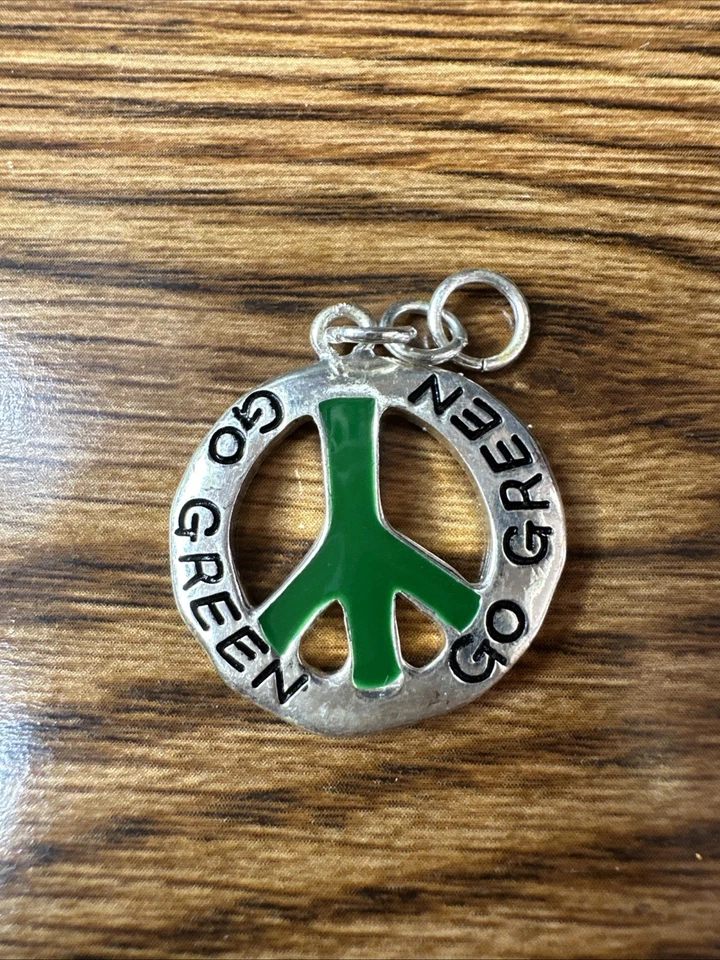 Dije colgante verde Go de 1" Foto 1 de 2