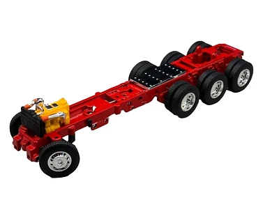 1/64 DCP PARTS RED PETERBILT 359/379/389 270" TRI AXLE FRAME - Image 1 of 4