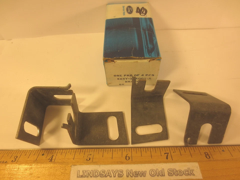 4 PIEZAS 1 CAJA FORD 1986/1991 MERCURY SABLE "SOPORTE" (MONTAJE DE FAROS) DIESTRO/IZQUIERDO NOS Foto 1 de 1