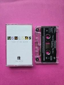 Genesis - Turn It On Again: The Hits - Cassette Tape (1999) - Phil Collins - Foto 1 di 2