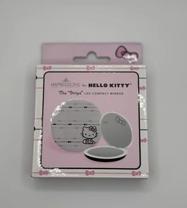 Impressionen Hello Kitty Spiegel mit 3-facher Vergrößerung Neu. - Bild 1 von 3