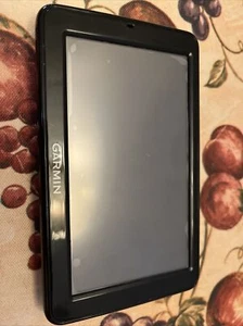 Sistema de navegación GPS Garmin almacenamiento no probado subasta encontrar piezas o reparación - Imagen 1 de 2