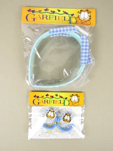 Cerchietto e cravatte per capelli Garfield nuovo *vintage* fondo di magazzino Jim Davis PAWS 1978 blu - Foto 1 di 6