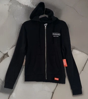 Nuevo Oficial Nintendo Nueva York 1889 Mario Moneda Sudadera con Capucha Negra Mujer Talla L Foto 1 de 4