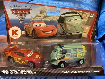 Disney PIXAR Cars 2 Lightning McQueen con neumáticos de carreras y Fillmore con auriculares coches Foto 1 de 4