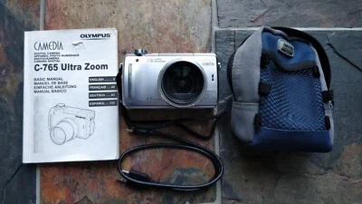Olympus CAMEDIA 765 Ultra Zoom 4.0MP Digital Camera Silver - Spares/Repair - Image 1 of 4