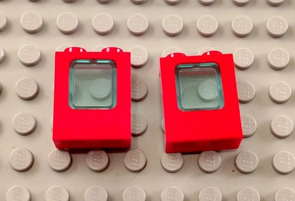 LEGO Lot of 2 Red 1x2x2 Airplane Windows with Translucent Light Blue Glass - Image 1 of 1