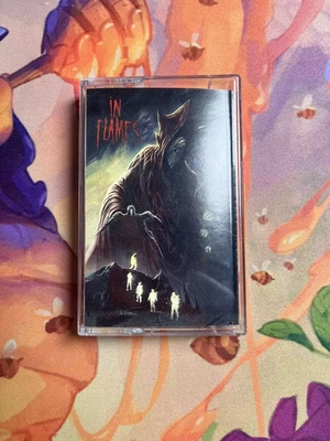 In Flames - Foregone Colored Cassette , Transparent Red New - Image 1 of 3