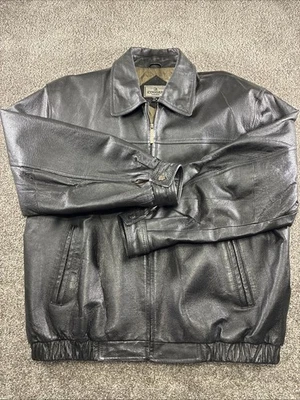 Chaqueta de bombardero negra de cuero Cougar para hombre con cremallera frontal mangas a presión Abrigo forrado XL Foto 1 de 4