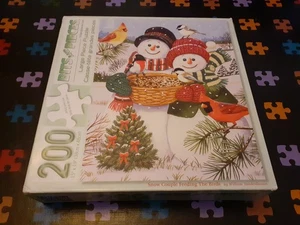 🧩 Schneepaar füttert die Vögel 200 Teile Teile Puzzle vollständig - Bild 1 von 3