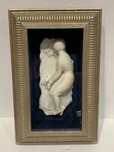 Extraordinary marble sculpture of a reclining woman framed as a wall hanging 8”