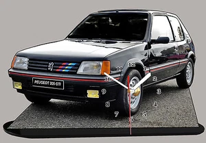 AUTOMOBILE MINIATURE, PEUGEOT 205 GTI -01, Peugeot205 GTI noire en horloge - Foto 1 di 1