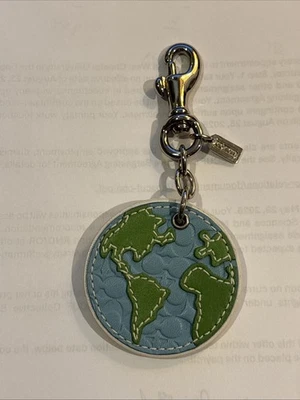 🎁Charme chaveiro/bolsa globo de couro original Coach - Imagem 1 de 4