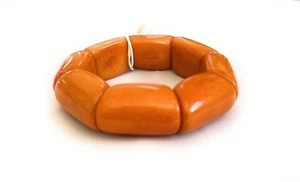 Brazalete Naranja Tagua Tuerca Panel Elástico Vegetales Marfil Hecho en Ecuador - Imagen 1 de 4