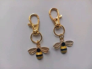 COLGANTE ABEJORRO ENCANTO ESMALTE ABEJA BROCHE LLAVERO BOLSO CREMALLERA X2 NUEVO REGALO  - Imagen 1 de 2