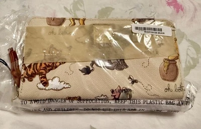 NUEVO CON ETIQUETAS Disney Clásico Winnie the Pooh Dooney and Bourke Cartera Muñequera Foto 1 de 2