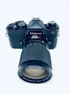 Nikon FE 35 MM Vintage Film Camera Black Body And Zoom Lens - Tested/Works - Picture 1 of 23