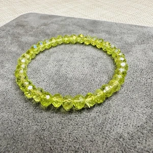 Armband gelb-grün – facettierte Perlen, elastisch, ca. 6 mm, Modeschmuck - Bild 1 von 3