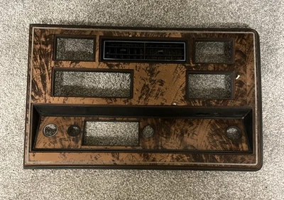 1972-1985 Oldsmobile Delta 88 98 Regency Radio Bezel Dash Trim Panel Woodgrain - Image 1 of 4