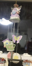 ceramic angel windchime,with butterfly, watering can, flowers chimes