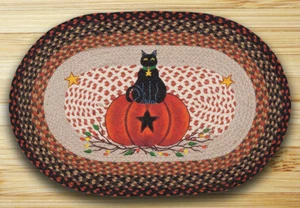 Alfombra trenzada de yute estampado con estampado de área ovalada. Alfombras de tierra. CALABAZA DE GATO NEGRA - Imagen 1 de 1