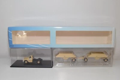 B33 1:64 NEO NEO64057 MACK B-61T 1957 ROAD TRAIN CARTER CARBONE BEIGE NUOVO C... - Immagine 1 di 4