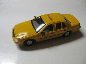 1:24-1:26 WELLY 1999 FORD CROWN VICTORIA PLAIN TAXI CAB W/O BOX - Picture 1 of 6