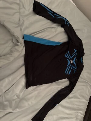 ELITE compresión manga larga talla S (los logotipos son dudosos pero en perfecto estado) Foto 1 de 4