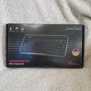 Perixx 409P Wired Mini Keyboard, PS/2 Interface, UK Layout, Black Compact - Picture 1 of 9
