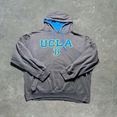 Sudadera con capucha de fútbol americano universitario UCLA Bruins para hombre talla 2XL gris coliseo Foto 1 de 4
