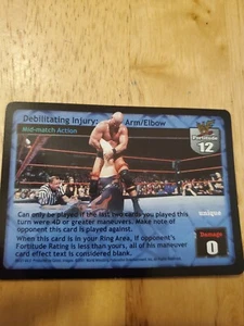 WWE WWF Raw Deal CCG - Debilitating Injury - Arm/Elbow - Rare - Picture 1 of 3
