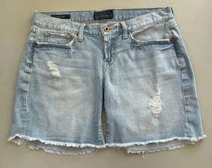 Jeans donna Lucky Brand taglia 4/27 Laguna corto vita bassa effetto invecchiato lavaggio chiaro blu - Foto 1 di 11