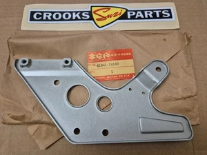 NOS 61341-14100 RM100 X 1981 original Suzuki Kettenführungsplatte außen hinten - Bild 1 von 7