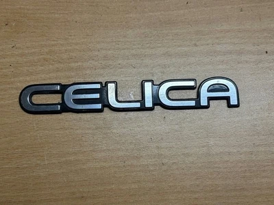 OEM Toyota Celica 6th gen st202,st200,at200 badge 75441-20380 - Image 1 of 2