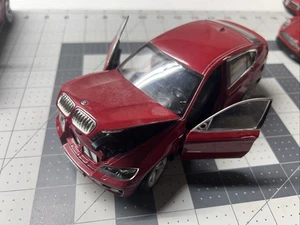 BMW X6 2008 Maßstab 1:24 Druckguss-Metallmodell von Welly - rot - Bild 1 von 7
