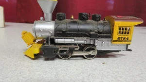 #6784 LOCOMOTORA MOTOR NEGRO/AMARILLO 0-4-0 ESCALA HO - Imagen 1 de 7