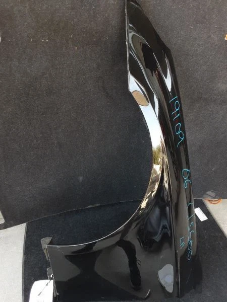 Mercedes Benz CLS500 2006 LH guardabarros delantero negro Foto 1 de 4