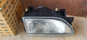 1AF007786041 PROIETTORE DESTRO PER FORD ESCORT V ORION III 92-95 HELLA - Imagen 1 de 4