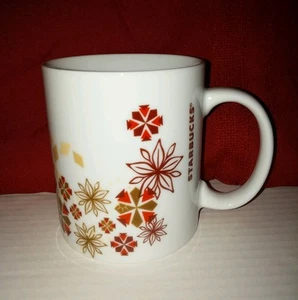 Starbucks Holiday Kaffeebecher Tasse Weihnachten Weihnachtsstern Blume Schneeflocke  - Bild 1 von 6