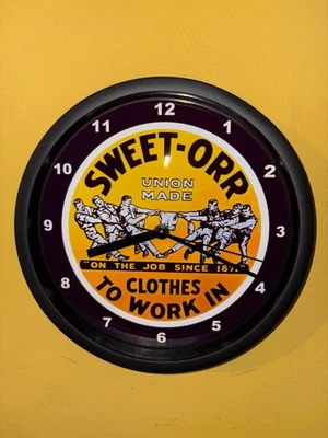 Letrero de reloj publicidad cueva hombre tienda ropa trabajo Sweet Orr Foto 1 de 3