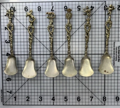 Juego de cuchara pala de recuerdo vintage adornado caballo león Cupido hecho en Italia Foto 1 de 4