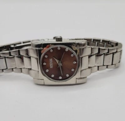 Reloj Kenneth Cole A126-11 Cara Marrón Tono Plateado Banda Cuarzo Damas Mujeres Foto 1 de 4