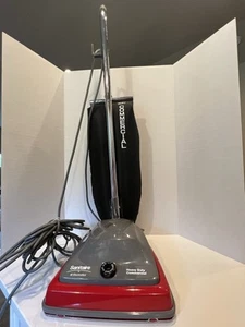 Aspiradora vertical comercial Sanitaire SC679 12" camino rojo/gris/negro ~ usada ligeramente - Imagen 1 de 7