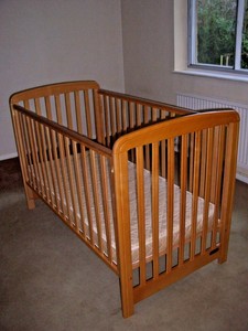 cosatto drop side cot
