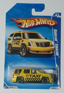 2009 Cadillac Escalade Taxi Yellow Hot Wheels Rare Vintage On Card - Picture 1 of 3