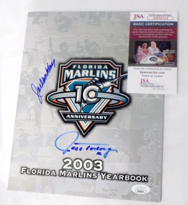JACK MCKEON & JEFF TORBORG Signed Auto 2003 FLORIDA MARLINS YEARBOOK JSA 💎 COA - Image 1 of 4